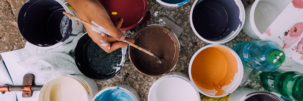 many colors of paint in buckets 